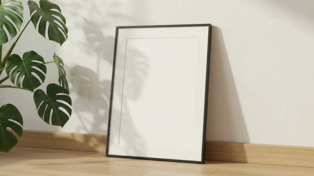 Black Frame Video Mockup with Mat and Monstera — video mockup
